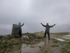 Gareth and Lawrence on Loughrigg on a wild day