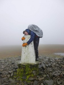 Nathan celebrates reaching the top of The Merrick
