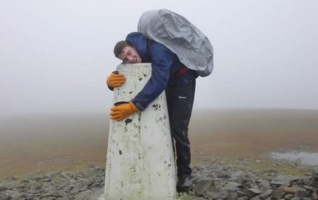 Nathan celebrates reaching the top of The Merrick